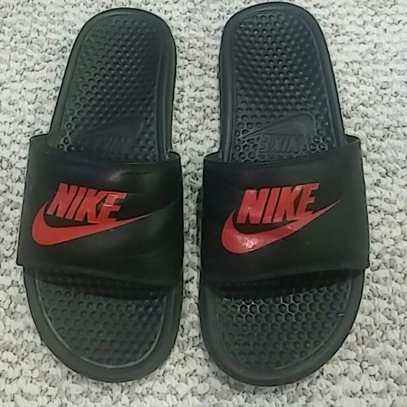 red and black nike slippers